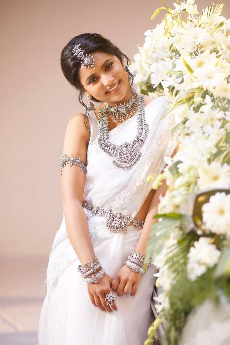 Actress #Anika definitely steals our heats in the beautiful white saree photoshoot stills